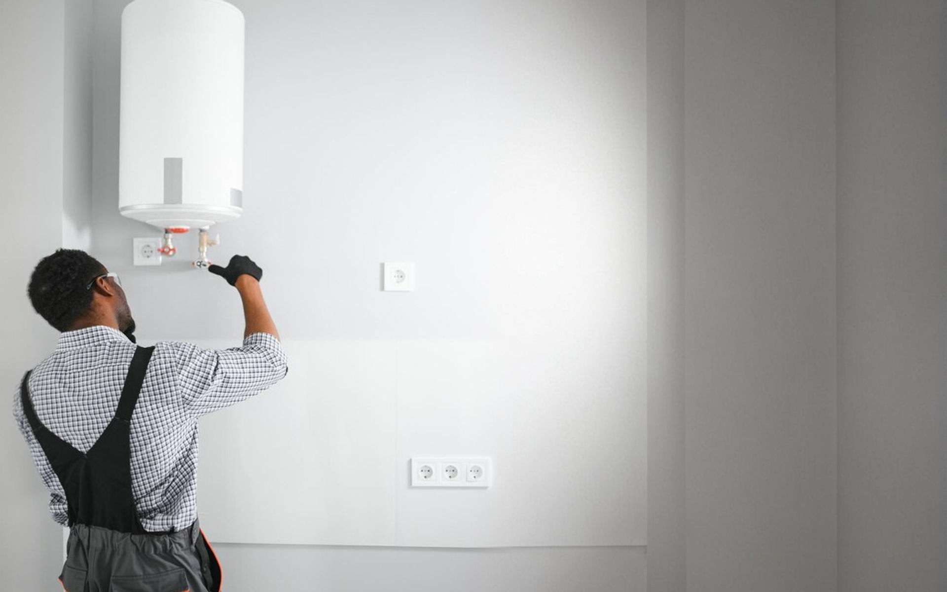 Water Heater Boys technician working on water heater